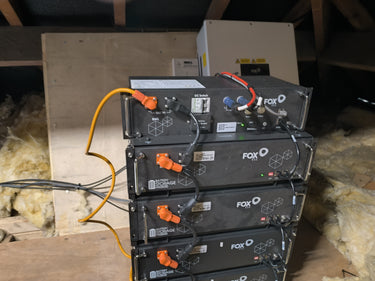 Stacked Fox HV2600 batteries connected to AC charger
